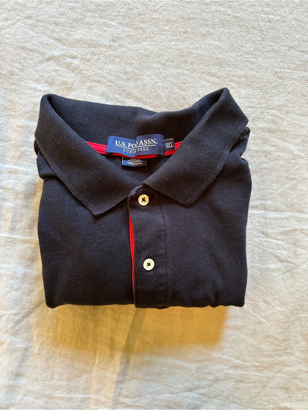 U.S. Polo Assn. Black Polo with Red Inner Placket